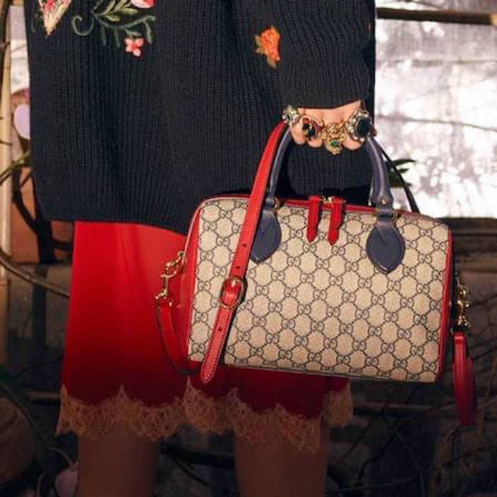 Louise Vuitton branded handbag