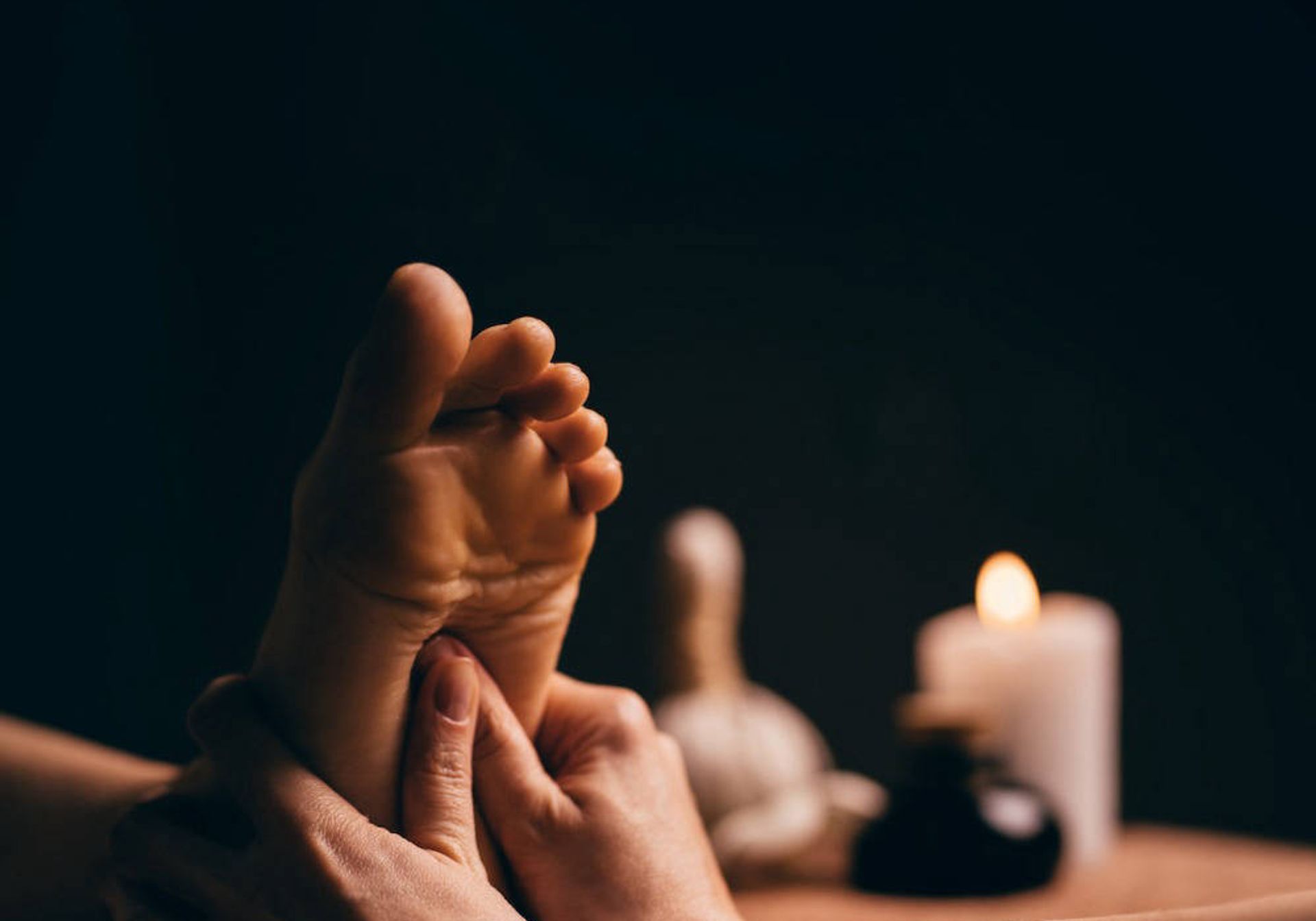 Reflexology session with candles