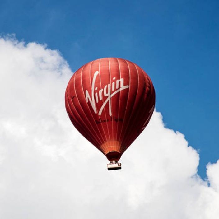 Virgin hot air balloon in sky