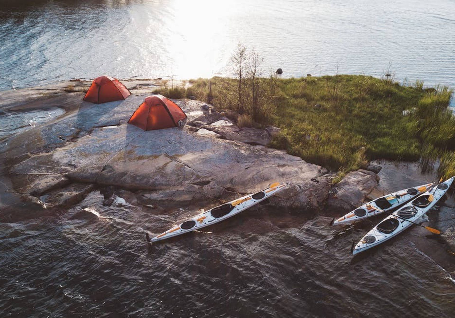 Kayaks on the bank of Sweden's archipelago