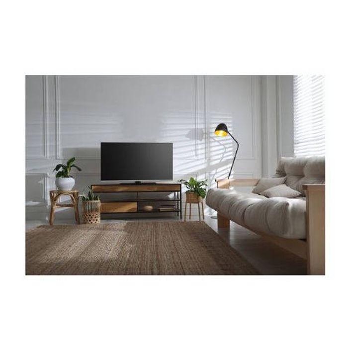 TV placed on a TV table in living room