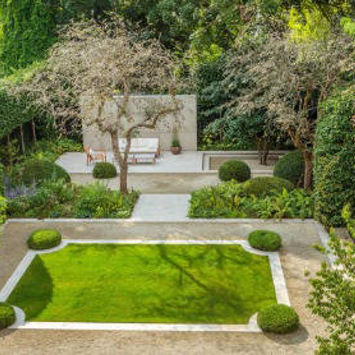 Stunning garden with neat grass square