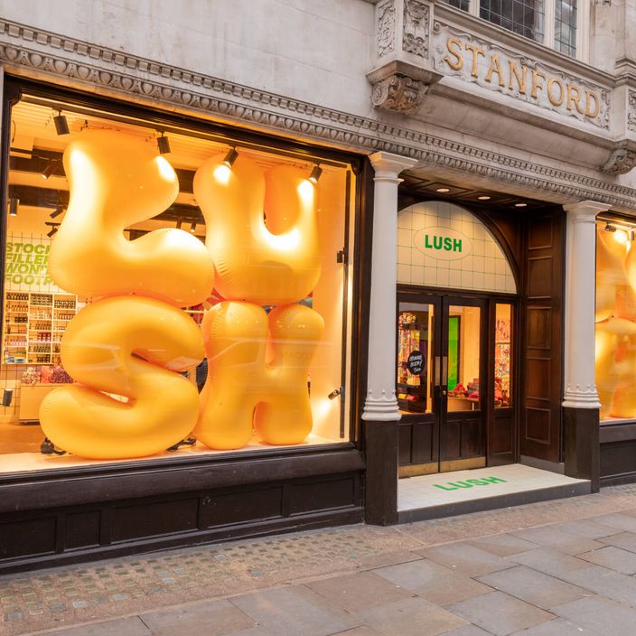 woman holding pot of dream cream