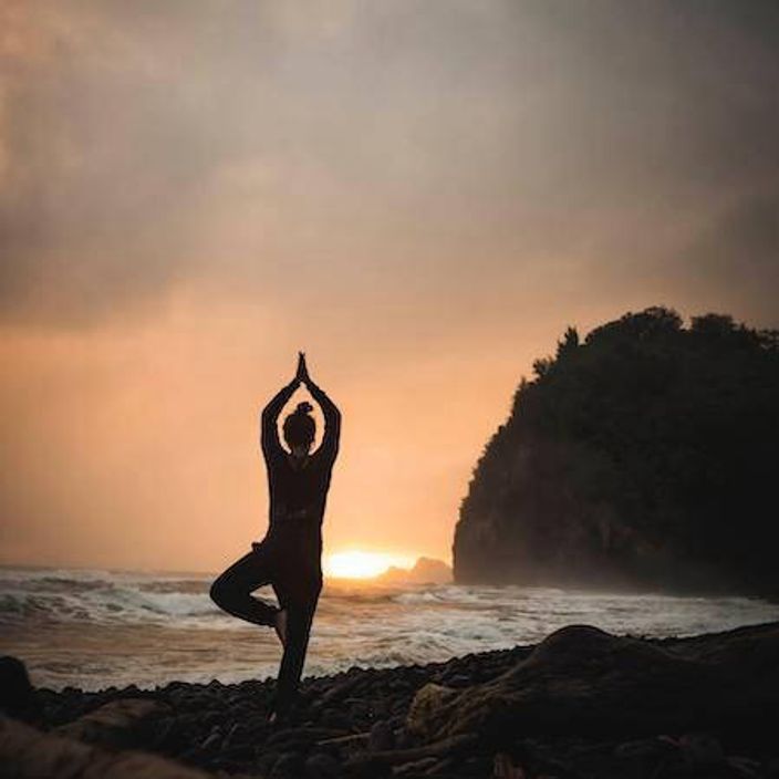 Vinyasa yoga at sunset