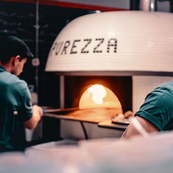 two pizza makers from purezza