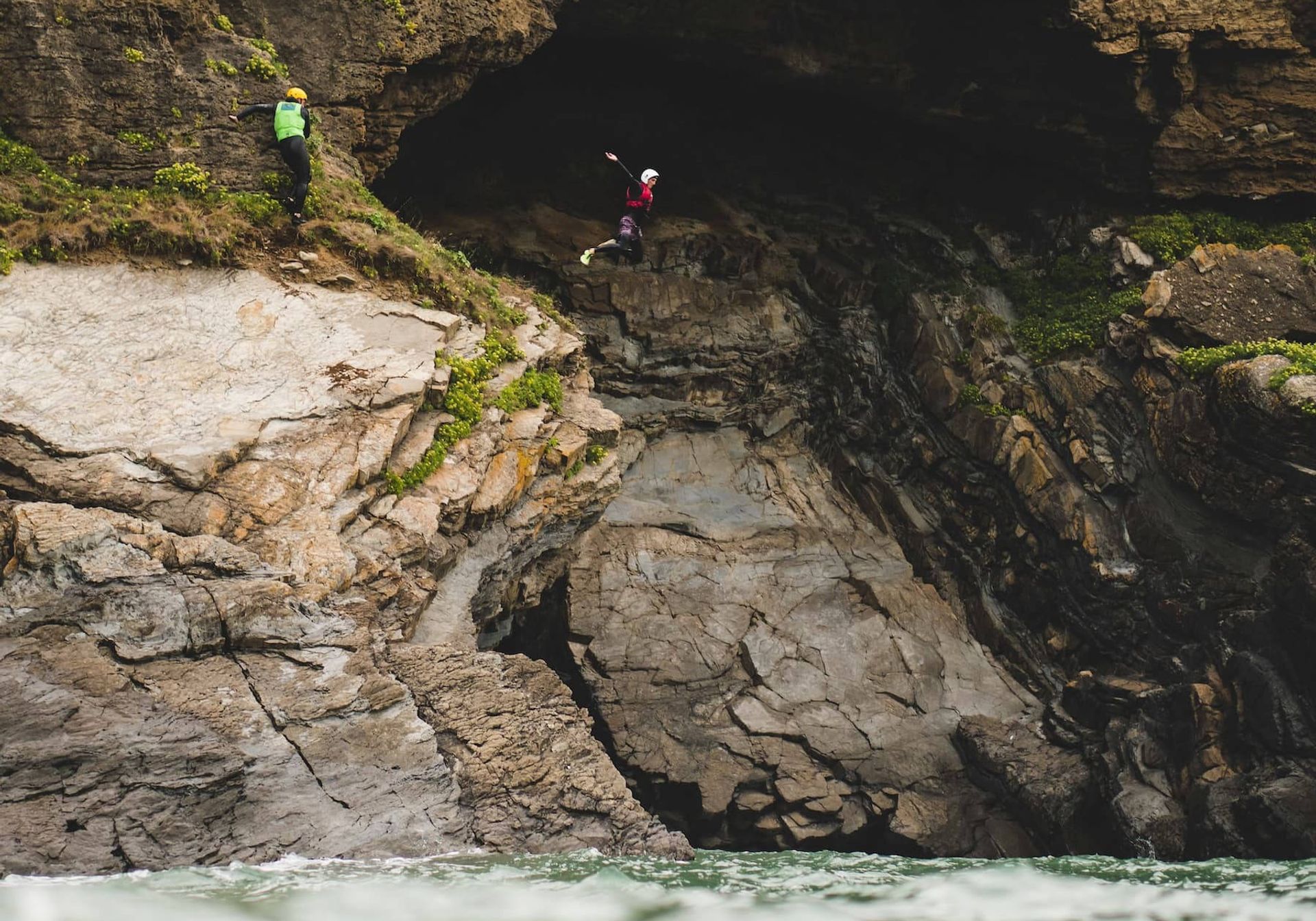 A girl jumping off a cliff 