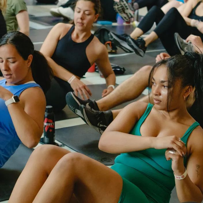 4 people wearing lululemon winter wear including cosy knits & puffer jackets