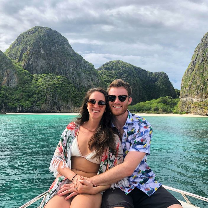 Couple exploring a waterfall