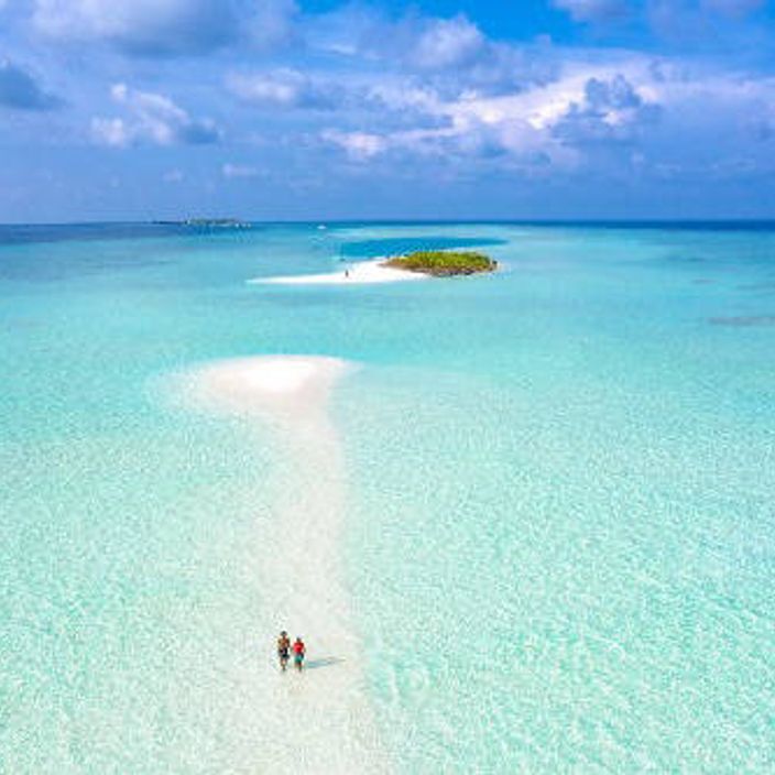 Couple walking on beautiful island