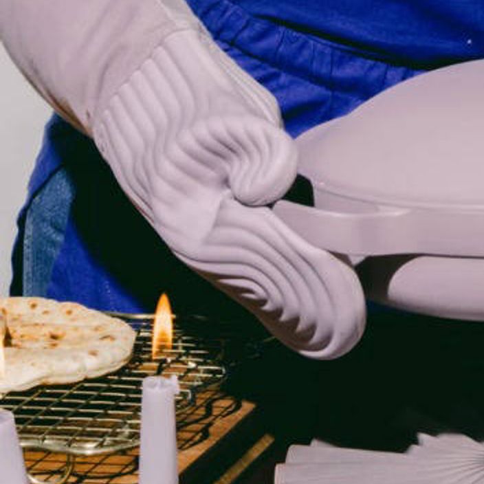 lilac oven mitts preparing food