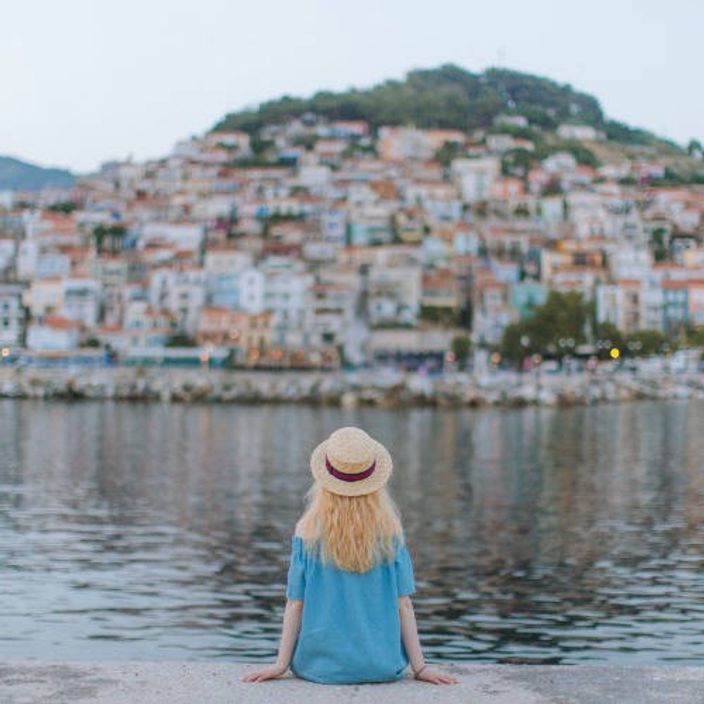 Woman sat overlooking the city