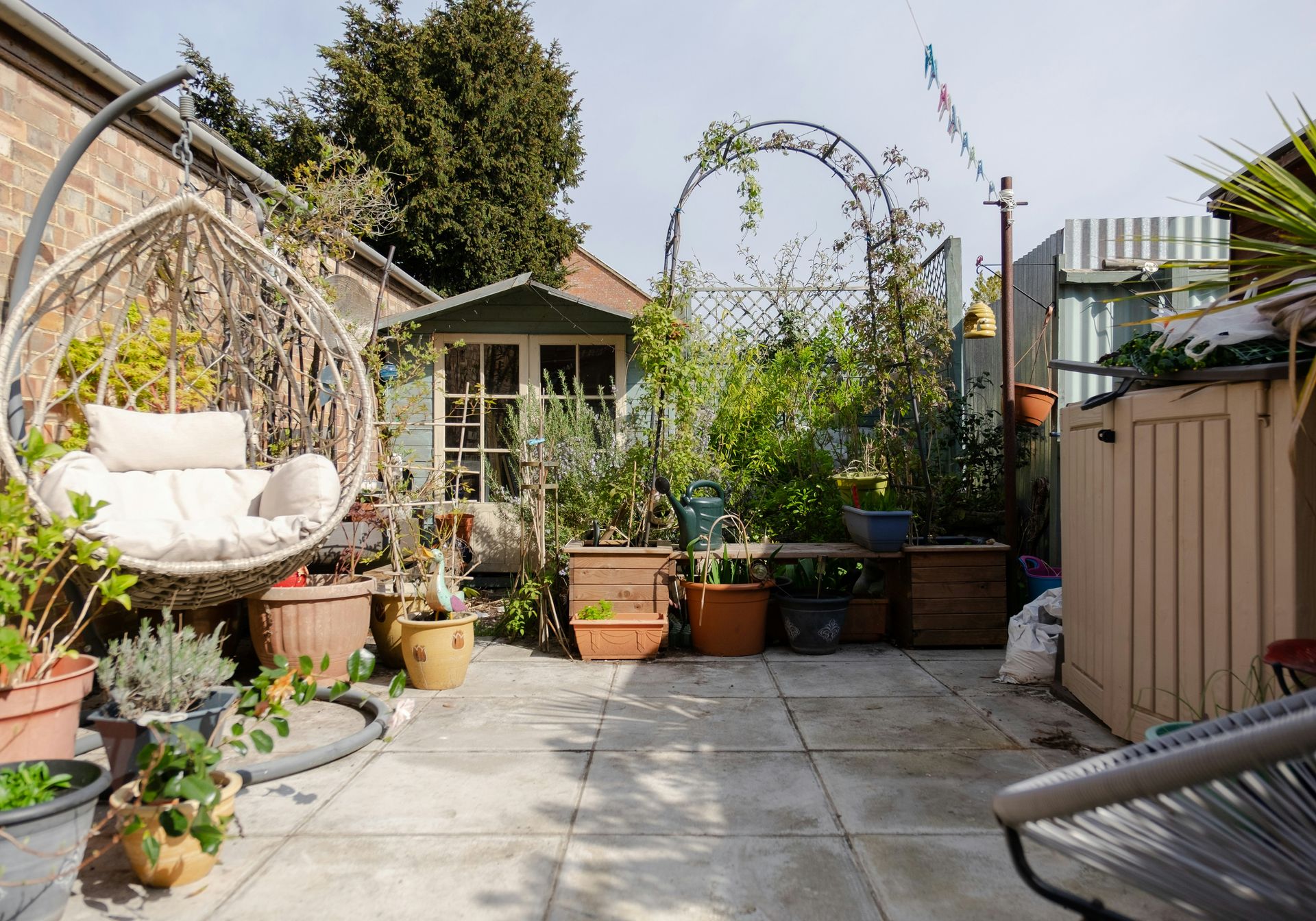 Garden table and chairs with a parasol