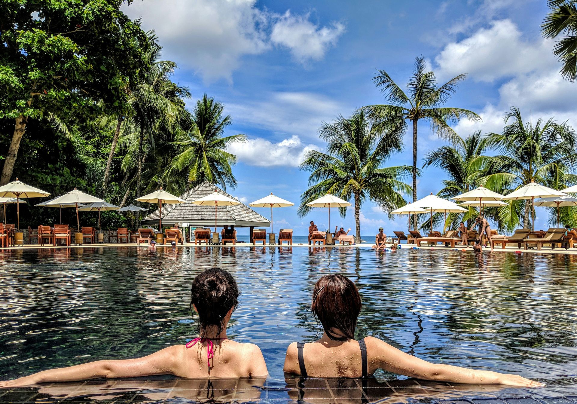 Inflatable flamingo in an infinity pool