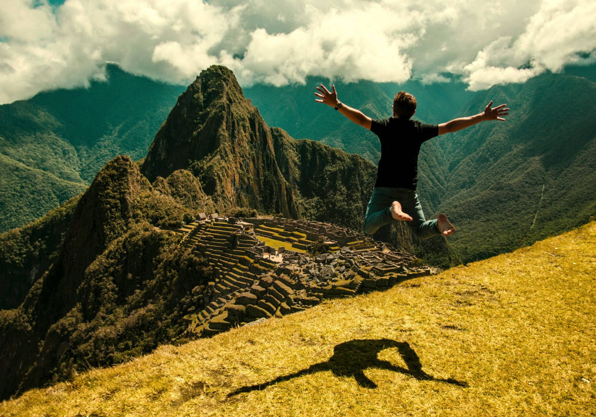 Man looking out over Machu Piccu